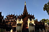 Myanmar - Mandalay, Shwe In Bin Kyaung a wonderful example of the Burmese unique teak architecture and wood-carving art.